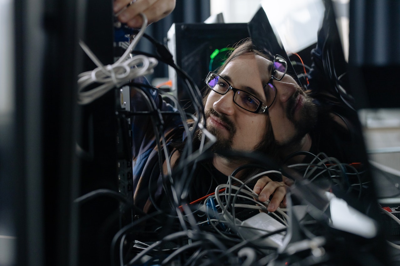 a network engineer looking at a server